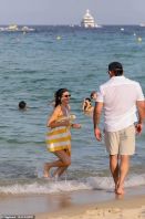 99987435-14873753-She_emerged_from_the_ocean_in_her_towel-a-50_1751609503162.jpg