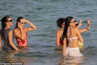 99987459-14873753-And_looked_to_be_posing_for_a_group_snap_together-a-49_1751609503162.jpg